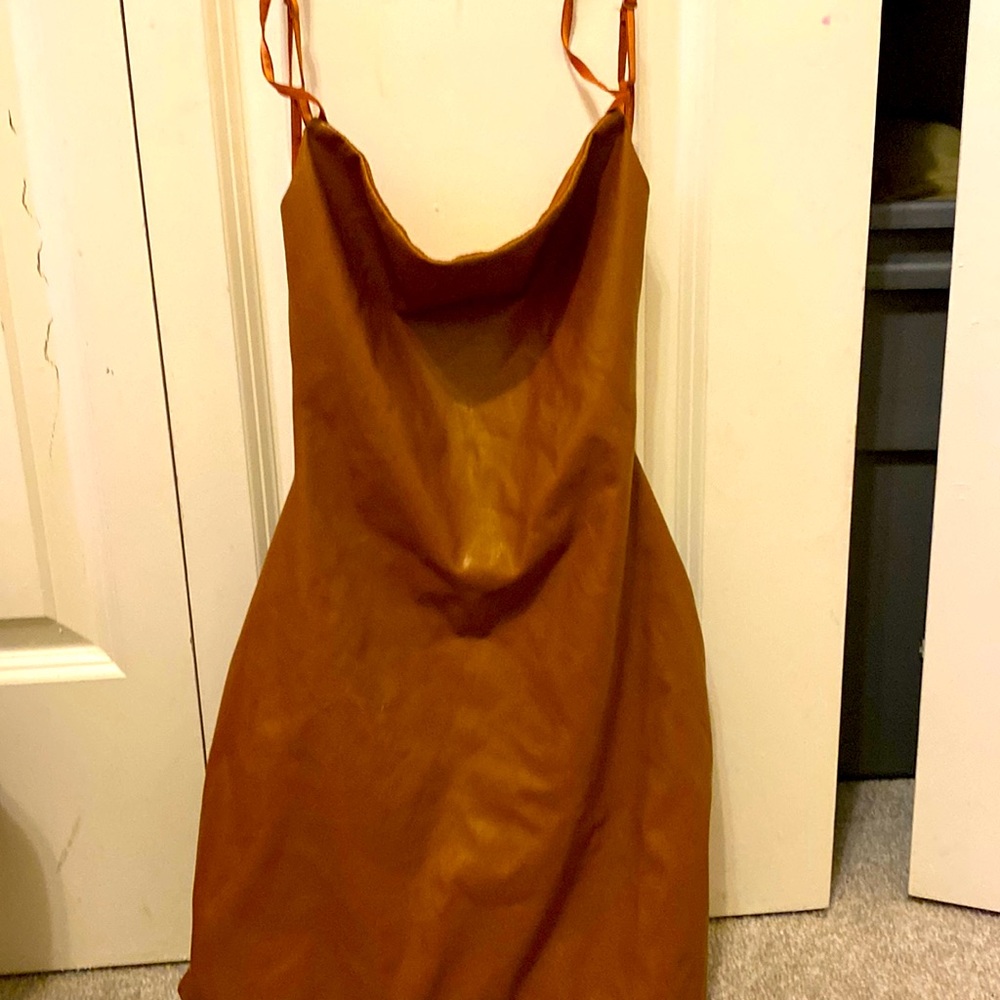 A brown leather dress his size small
